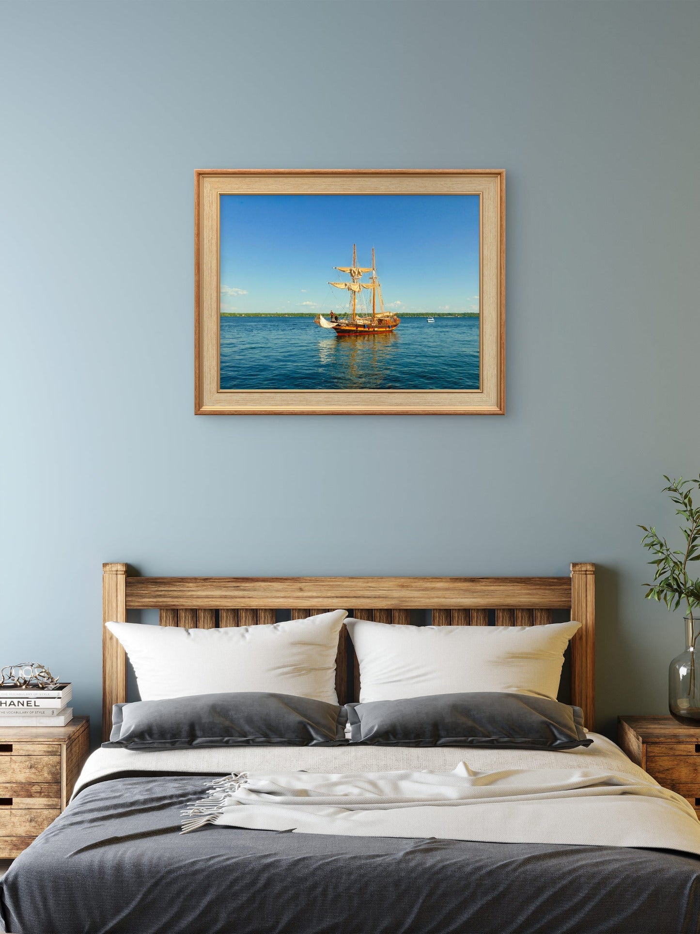 Graceful two - mast sailboat gliding beneath a flawless blue sky. - Byeutifull Art